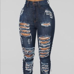 Distressed dark denim jeans